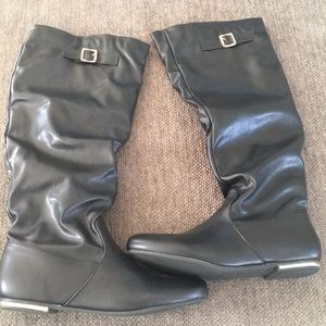 Black boots with gold detail